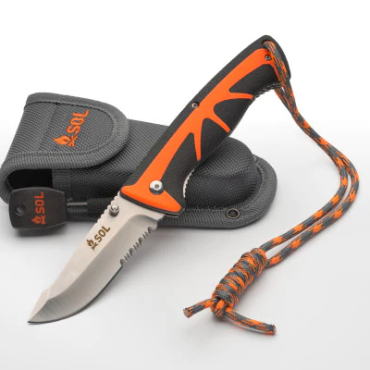 Folding Knife hero shot resting on sheath showing flint and tinder lanyard